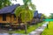 Wooden bamboo cottages in natural tropical jungle resort Krabi Thailand