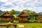 Wooden bamboo cottages in natural tropical jungle resort Krabi Thailand