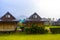 Wooden bamboo cottages in natural tropical jungle resort Krabi Thailand