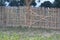 Wooden bamboo fencing for a farm