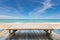 Wooden bamboo sunbeds on old wood ,beautiful beach and sea scene