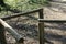 Wooden banisters of a simple bridge in nature