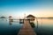 Wooden bar in sea and hut with clear sunrise sky in Koh Mak at Trat, Thailand. Summer, Travel, Vacation and Holiday concept