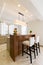 Wooden bar table in an elegant kitchen