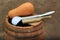 Wooden barrel with ladle, pumpkin and chopping board