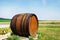 Wooden barrel for wine placed in field