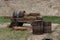 Wooden barrels and bales of hay in a large cart