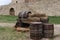 Wooden barrels and bales of hay in a large cart