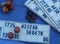 Wooden barrels and cards with numbers for playing lotto.