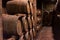 Wooden barrels for wine aging in the cellar..Italian wine
