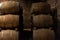 Wooden barrels for wine aging in the cellar..Italian wine