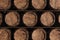 Wooden barrels for wine on a black background. Winemaking, wine. The concept of the production of alcoholic beverages. 3D