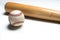 Wooden baseball bat and ball on white