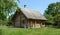 Wooden bath. Country bathhouse on the river bank. Belarusian village in summer