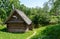 Wooden bath. Country bathhouse on the river bank. Belarusian village in summer