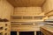 Wooden bathhouse sauna benches interior. Recreational room. Relaxing leisure in bath-house