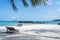 Wooden beach chair under coconut tree on beautiful beach at kohmak Island