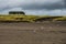 A Wooden Beach House Sit On A Small Hill On A Green Grassy Field In A Stormy Autumn Evening In Long Beach Washington