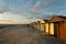 Wooden beach hut at sunset in West Wittering Beach