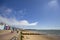 Wooden beach huts and pier on the coastline. Walton on the Naze  Essex  United