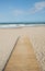 Wooden beach pathway to the ocean