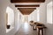 wooden beams contrast white plaster walls in pueblo-style hallway