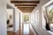 wooden beams contrast white plaster walls in pueblo-style hallway