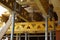 Wooden beams and girders supporting construction of a concrete floor in the newly constructed building