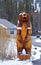 Wooden bear in snow