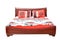 Wooden bed with colorful linen