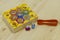 Wooden bee toy with tweezers for the development of fine motor skills in children. Montessori education. educational games