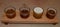 Wooden beer sampling tray with four brews