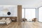 Wooden beige bedroom with bed on parquet floor and armchairs near window