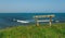 wooden bench by the beach