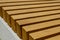 Wooden bench closeup, striped wood background, furniture detail