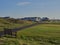 From a Wooden Bench looking over to Links House and the Carnoustie Golf Hotel around the 1st Tee and 18th Green.