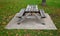 Wooden bench made of natural wood that turns gray over time. camping bench with table, curved bench made of solid wood arch. curve