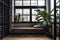 wooden bench with metal legs sits in front of black window industrial interior