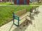 Wooden bench in the park on the street. recreation of people outdoors. seats made of natural materials for the rest of tired