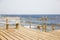 Wooden bench on the pier, seascape