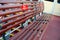 Wooden Bench seat on Boat ferry put on the warning sign for Do not stand on seats.