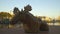 Wooden bench in the shape of a moose in the park