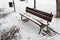 Wooden Bench in Snow, Frozen Winter Park, Outdoor City Architecture, Empty Plank Seat in Snowfall, Seasonal Travel