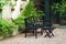 Wooden Bench and table in a pebble garden