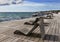 Wooden benches on seaside