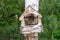 A wooden birdhouse made by children with their own hands for the exhibition