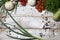 On a wooden bleached tabletop lies a set of vegetables for cooking