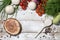 On a wooden bleached tabletop lies a set of vegetables for cooking