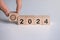 Wooden block with business goals in 2024. key performance indicator and business achievement goal concept