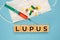 Wooden block form the word LUPUS